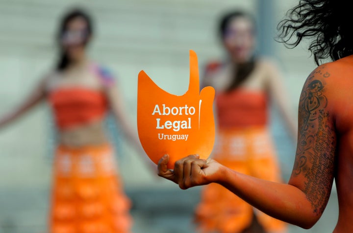 Pro-abortion activists protest in front of the Uruguayan Congress in Montevideo, Uruguay, Tuesday, Sept. 25, 2012. In 2022, in Uruguay, abortion is allowed on-demand. (AP Photo/Matilde Campodonico, File)