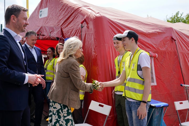 Biden shook hands with volunteers and first responders during a visit to Vysne Nemecke, Slovakia, near the border with Ukraine, on Sunday.