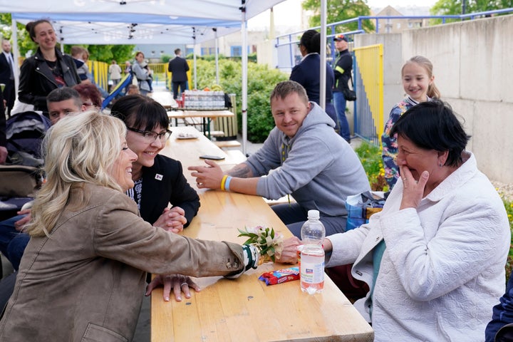 Biden, seen with refugees at a city-run refugee center in Kosice, Slovakia, on Sunday, went from table to table meeting the mothers and kids.