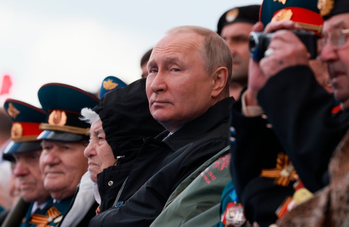 Russian President Vladimir Putin looks on during the Victory Day military parade marking the 77th anniversary of the end of World War II in Moscow, Russia, Monday, May 9, 2022. (Mikhail Metzel, Sputnik, Kremlin Pool Photo via AP)