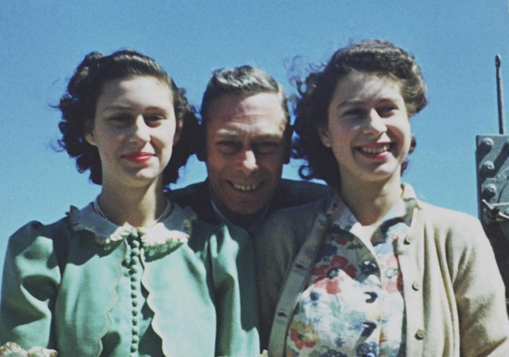 Princess Margaret and Princess Elizabeth with their father King George VI onboard HMS Vanguard in 1947.