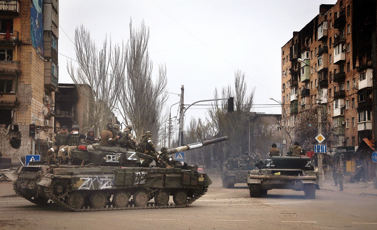 Russian military vehicles move in an area controlled by Russian-backed separatist forces in Mariupol, Ukraine, on April 23, 2022. (AP Photo/Alexei Alexandrov)