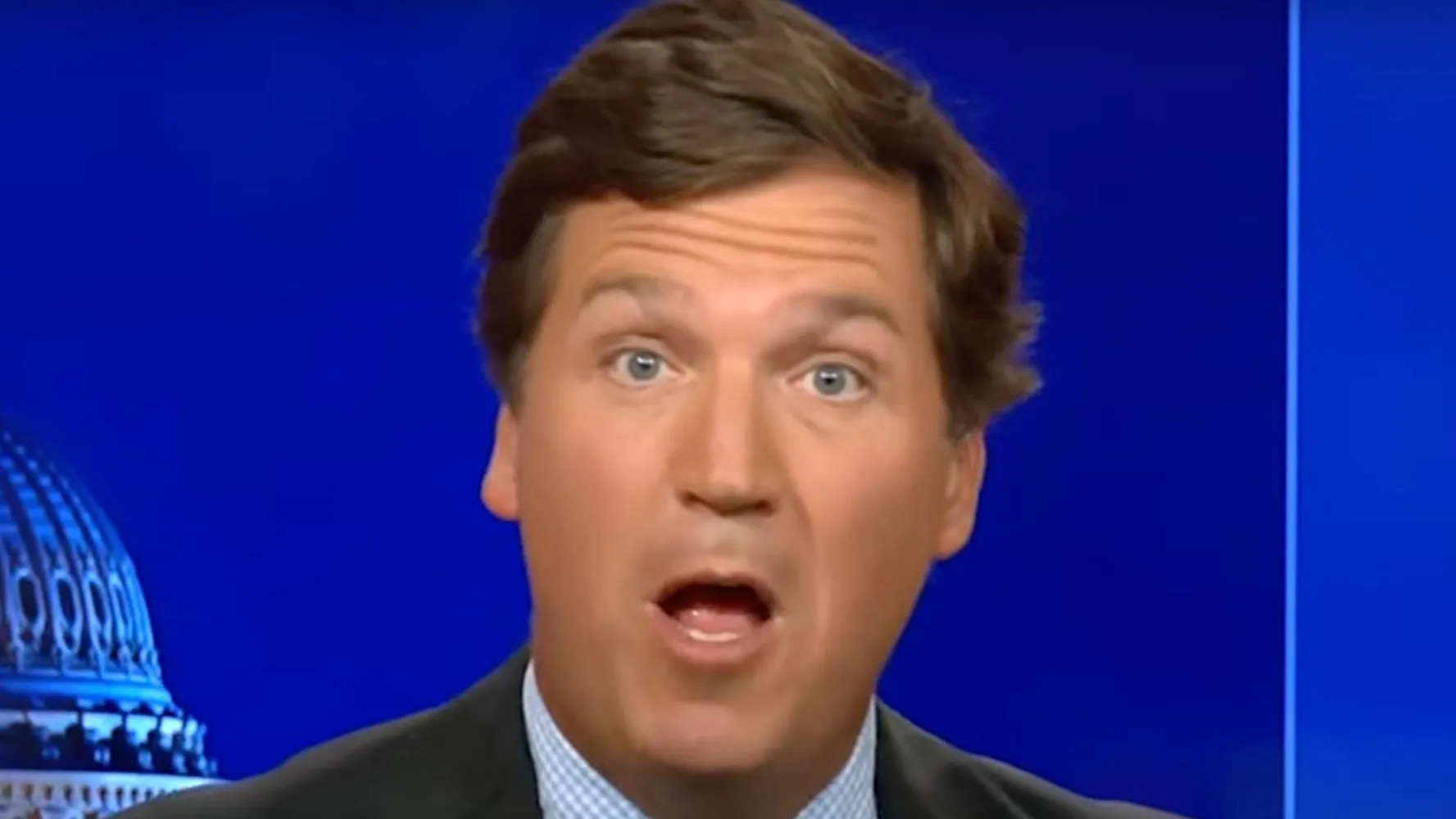 Tucker Carlson Undermined On His Own Show By Perfectly Timed Middle Finger