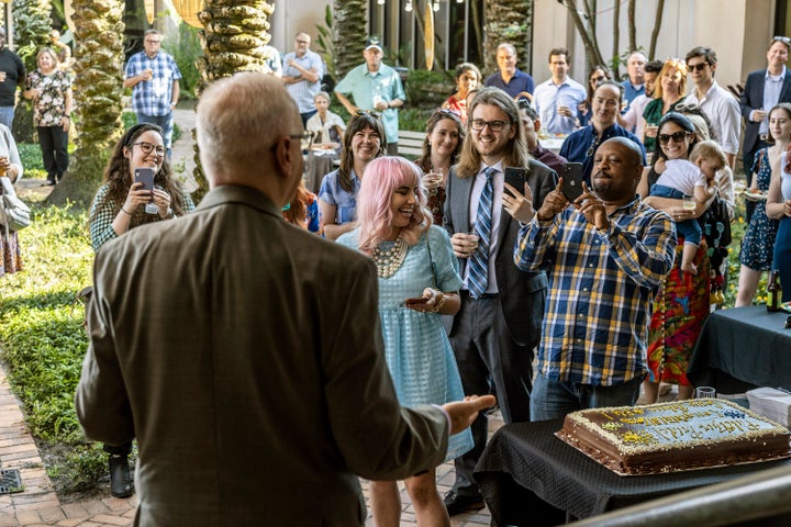 From front row left, Tampa Bay Times reporters, Rebecca Woolington, Eli Murrray and Corey C. Johnson celebrate with newsroom staff and guests as Times editor and vice president, Mark Katches talks about the trio winning the 2022 Pulitzer Prize for Investigative Reporting, at the Poynter Institute for Media Studies in St. Petersburg, Fla., on May 9, 2022. 