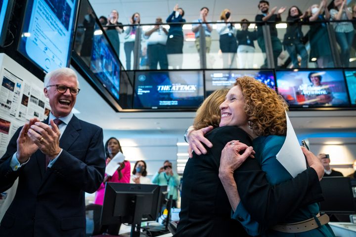 From left, Fred Ryan Publisher/CEO, Sally Buzbee, Executive Editor, and Matea Gold, National Editor celebrate in The Washington Post newsroom moments after winning the 2022 Pulitzer Prize for Public Service on May 9, 2022 in Washington, DC. 