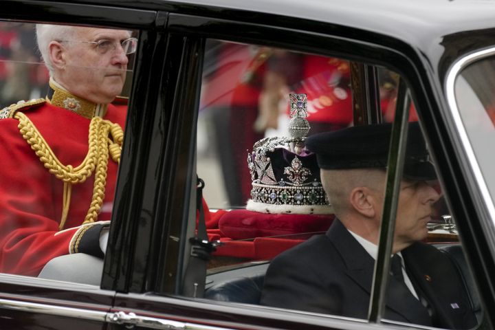 The imperial state crown arrives at the Palace of Westminster in London.