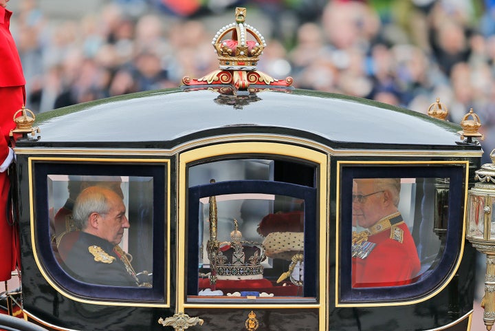 <strong>The imperial state crown travels in a carriage from Buckingham Palace towards parliament in 2016.</strong>