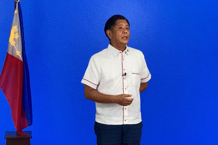 Presidential candidate Ferdinand Marcos Jr., son of late dictator Ferdinand Marcos Sr., speaks to members of the media, at his party's headquarters in Manila.