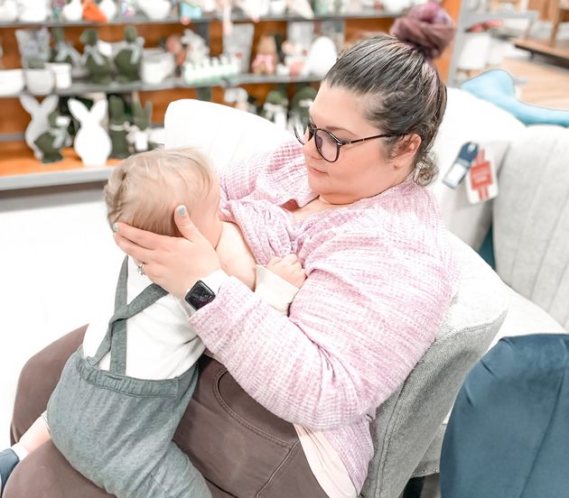 Suz Gillies-Smith, the body acceptance activist behind the @plussizebreastfeeding Instagram account, feeds her son at a TJ Maxx.