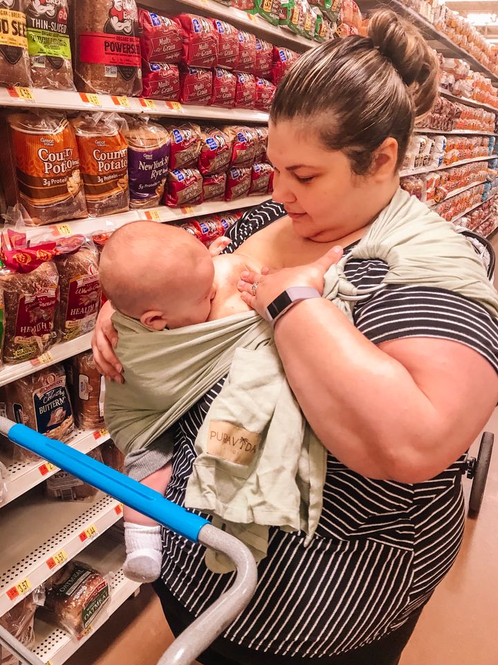 Suz Gillies-Smith often wears her baby in a ring sling carrier when nursing in public. 