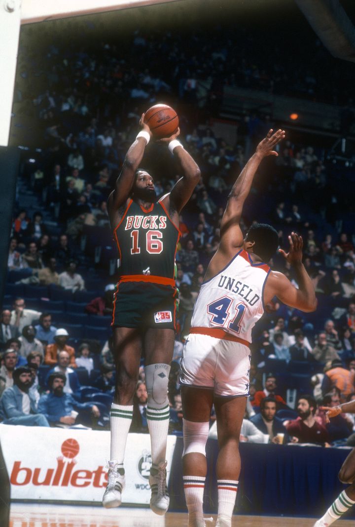 Bob Lanier shoots over Wes Unseld in a circa-1980 game.