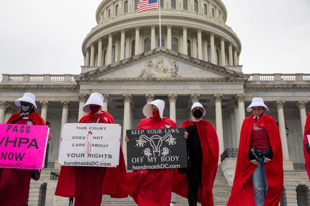 Pro-abortion women demonstrate outside the Supreme Court on May 8