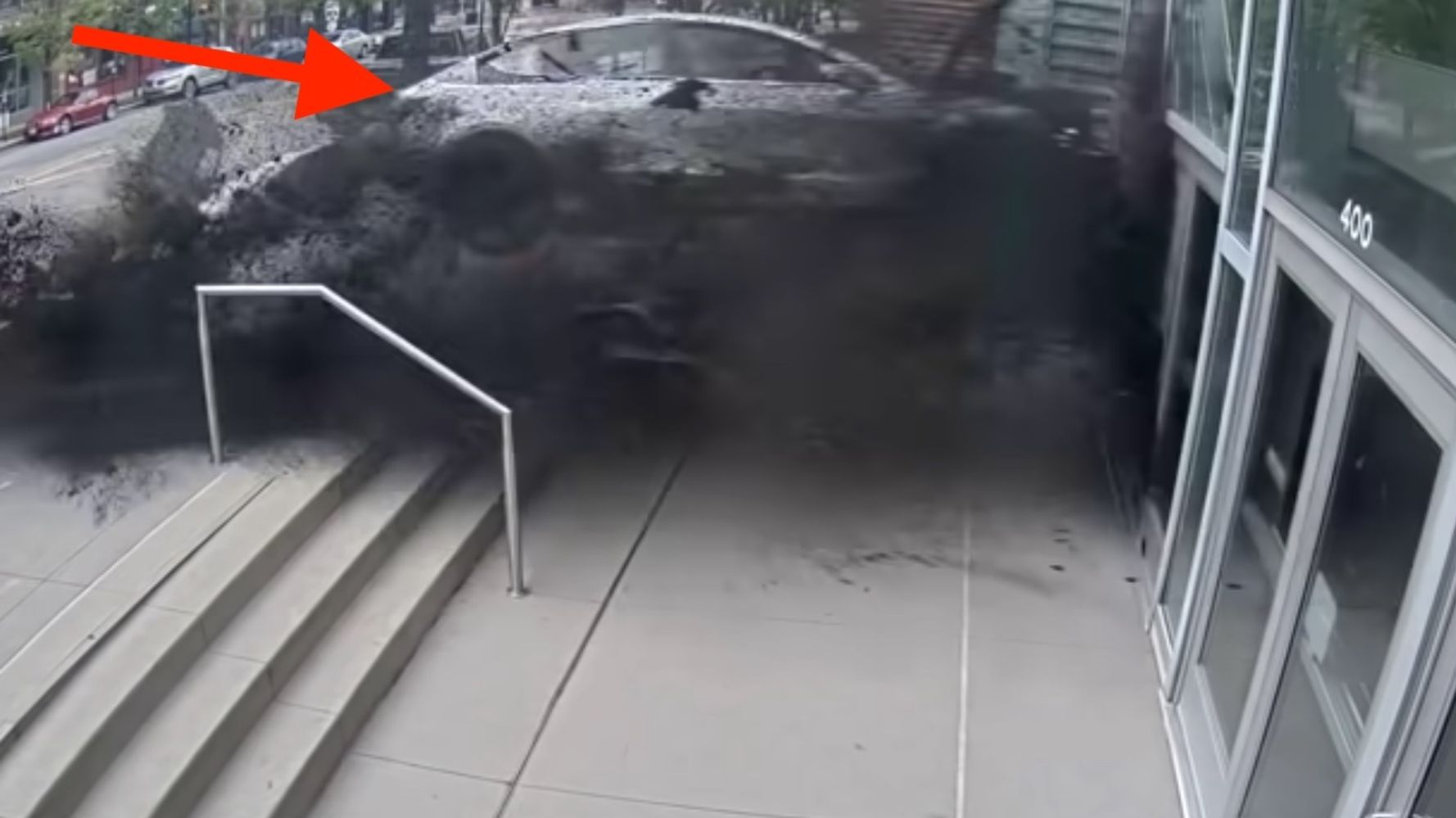 Watch Stunning Video As Tesla Goes Airborne, Slams Into Building At 70 MPH