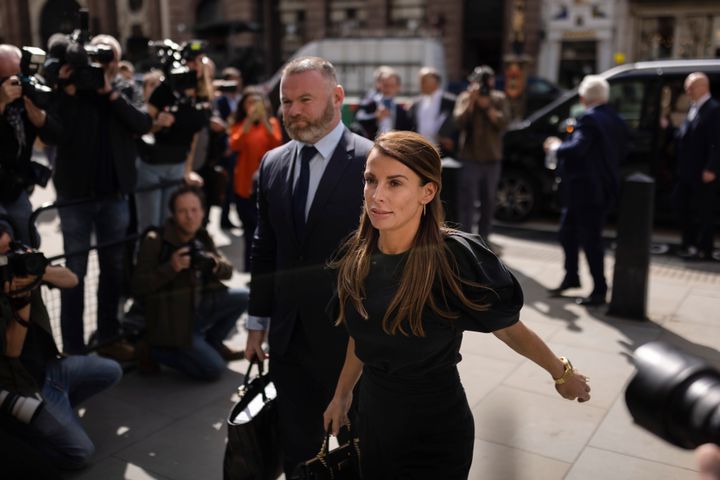 Coleen Rooney with husband Wayne Rooney outside the Royal Courts of Justice on Wednesday