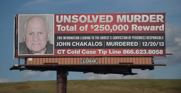 Prosecutors have alleged that Carman also fatally shot his grandfather, John Chakalos, to obtain inheritance money in 2013. A billboard in Hartford, Connecticut, is seen offering a reward for the arrest and conviction of the person or persons responsible.