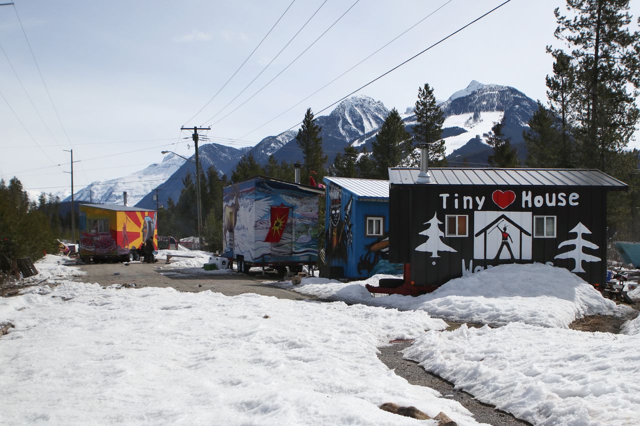 The Tiny House Warriors village is located beside a camp that houses 550 Trans Mountain Pipeline workers.