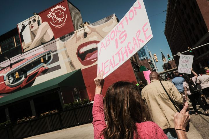 Abortion rights supporters march in downtown Detroit after a draft document was leaked showing the United States Supreme Court preparing to overturn Roe v.  Wade. 