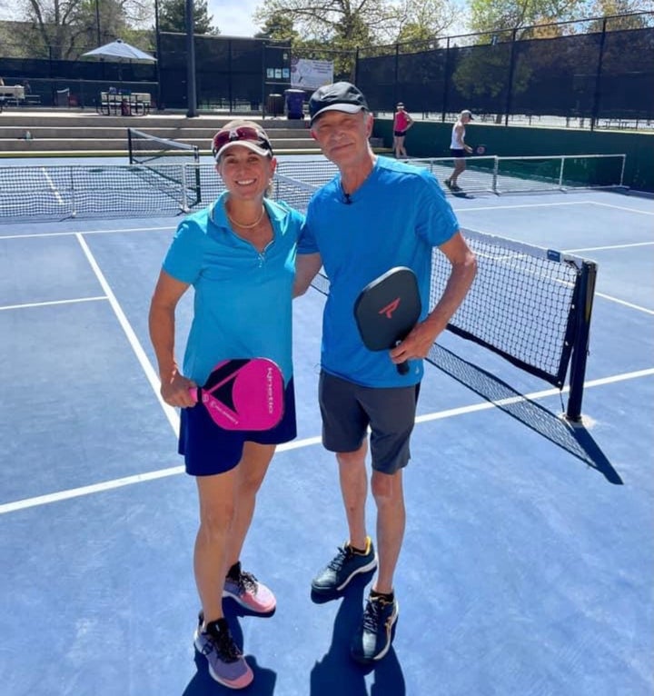 The City of Denver reached a settlement with 71-year-old Arslan Guney, right, in court Wednesday. Guney played pickleball with his attorney Hollynd Hoskins, left, after the settlement.