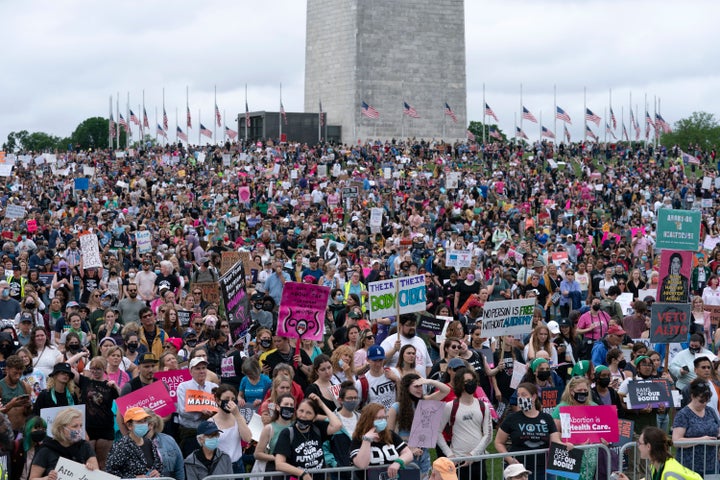 Abortion rights activist rally at the Washington Monument before a march to the U.S. Supreme Court.