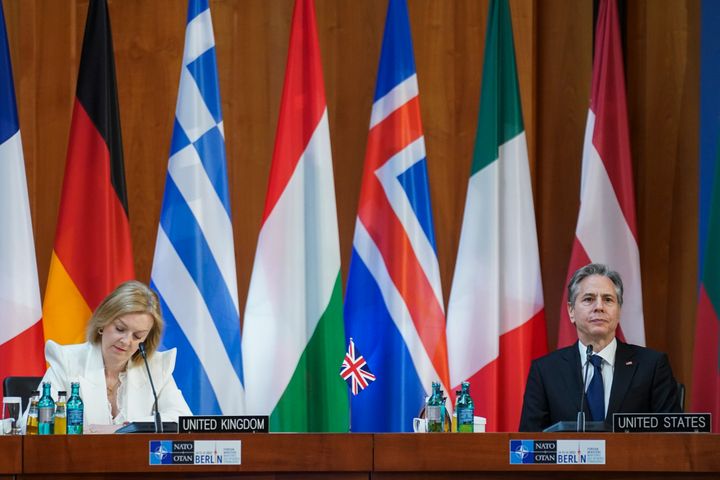 US Secretary of State Antony Blinken and UK Foreign Secretary Liz Truss speak at the informal meeting of NATO Foreign Ministers in Berlin, Germany, Sunday, May 15, 2022. (Kevin Lamarque/ Pool via AP)