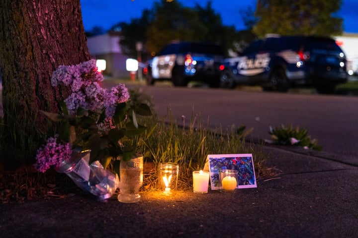 A small vigil is seen set up across the street from a Tops grocery store in Buffalo, New York, after a heavily armed 18-year-old white man entered the store in a predominantly Black neighborhood and shot 13 people, killing 10.