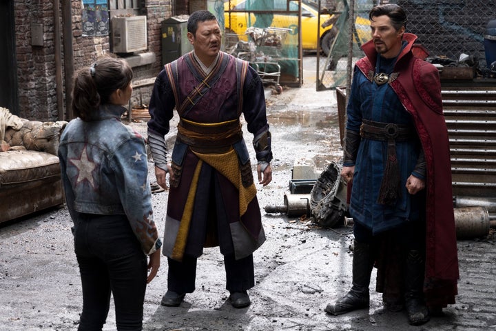 This image released by Marvel Studios shows, from left, Xochitl Gomez as America Chavez, Benedict Wong as Wong, and Benedict Cumberbatch as Doctor Strang in a scene from "Doctor Strange in the Multiverse of Madness." (Marvel Studios via AP)