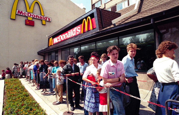 Russians wait in line outside a McDonald's fast food restaurant in Moscow in 1991. Two months after the Berlin Wall fell, another powerful symbol opened its doors in the middle of Moscow: a gleaming new McDonald’s. It was the first American fast-food restaurant to enter the Soviet Union.