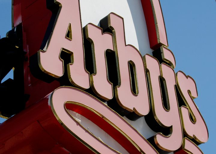 FILE - This March 1, 2010, file photo shows an Arby's restaurant sign in Cutler Bay, Fla. Arby's is buying casual dining chain Buffalo Wild Wings in a deal worth about $2.4 billion. Arby's Restaurant Group Inc. said Tuesday, Nov. 28, 2017, that it will pay $157 per share. (AP Photo/Wilfredo Lee, File)