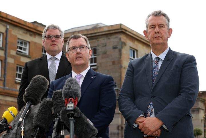Sir Jeffrey Donaldson (centre), speaks to the media alongside Gavin Robinson (left), and Edwin Poots (right), after their meeting with Boris Johnson at Hillsborough Castle.
