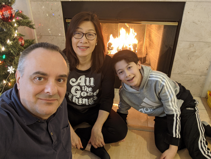 The author with her husband and her son on Christmas in 2020.