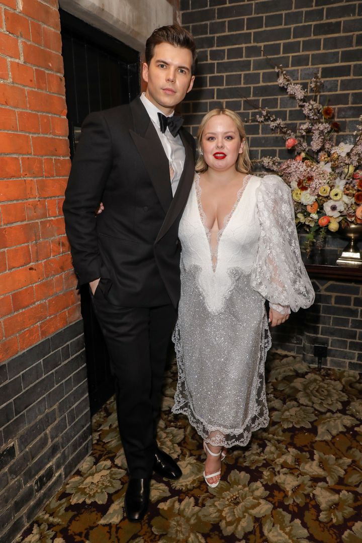 Luke Newton and Nicola Coughlan attend the Netflix BAFTA 2022 party in March.