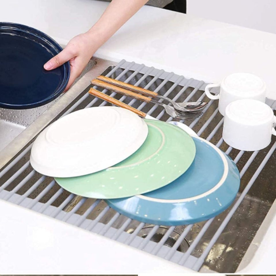 A roll-up over-the-sink drying rack for dishes