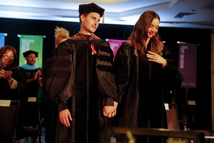 Snapchat co-founder Evan Spiegel and wife Miranda Kerr receive honorary degrees at the 2022 Otis College of Art and Design commencement ceremonies.