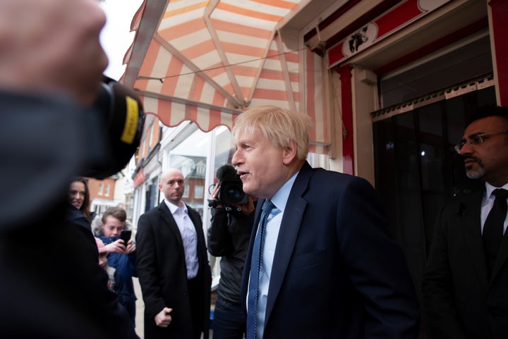 Johnson speaks to members of the press in This England