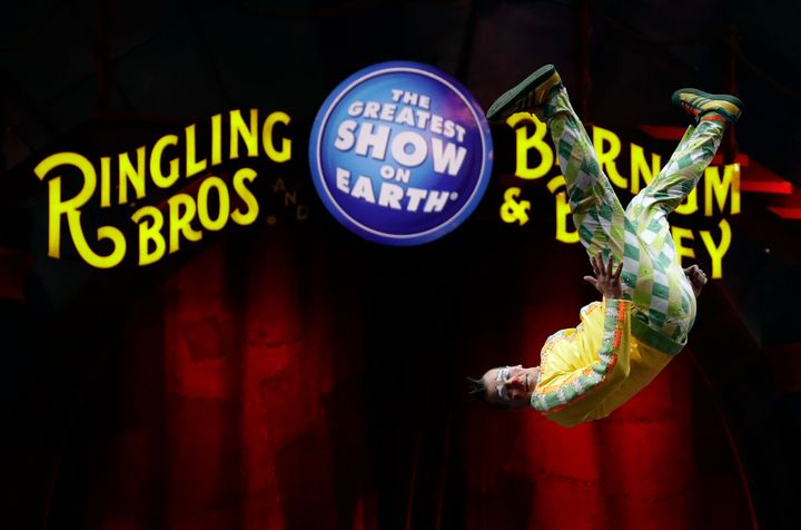 A Ringling Bros. and Barnum & Bailey clown does a somersault during a performance in 2017.