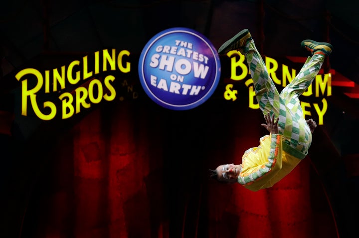 A Ringling Bros. and Barnum & Bailey clown does a somersault during a performance in 2017.