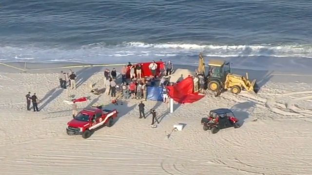 18-Year-Old Dies In Sand Collapse After Digging Hole On Beach, Police Say.jpg