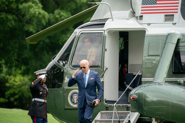 President Joe Biden salutes while disembarking Marine One on the South Lawn of the White House in Washington, D.C., on May 18, 2022. Biden traveled to Joint Base Andrews to receive a briefing on interagency efforts to prepare for and respond to hurricanes this season.