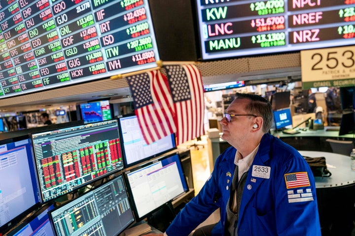 FILE - Trader Patrick King works the floor at the New York Stock Exchange, Thursday, May 12, 2022, in New York. (AP Photo/John Minchillo, File)