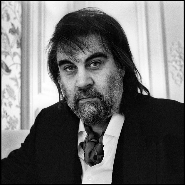 Greek composer and keyboard player Vangelis poses at his apartment in Paris, 9th June 1991. (Photo by Rob Verhorst/Redferns)