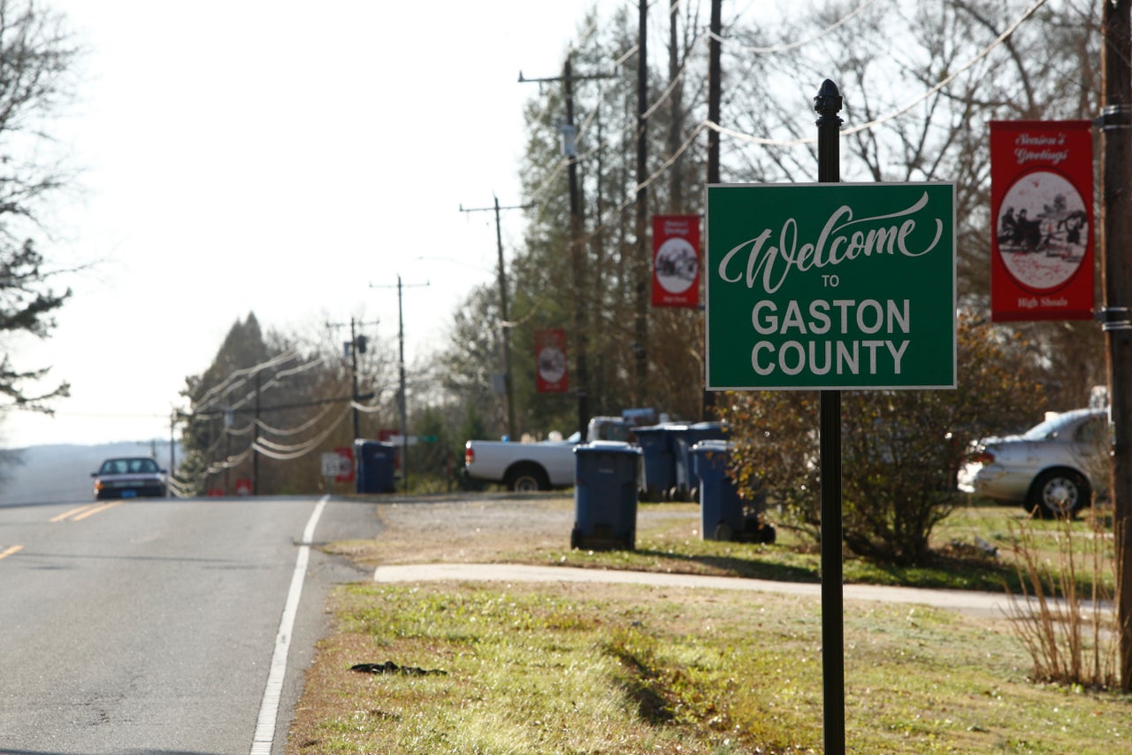 A sign welcomes motorists to Gaston County in High Shoals, North Carolina, on Jan. 5. Piedmont Lithium is looking to open a hard-rock mine in the rural county. Many locals fear the project could unleash devastating pollution on their idyllic community.