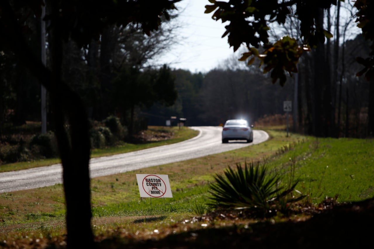 Signs like this one opposing Piedmont Lithium’s proposed pit mine mark the roadsides of Gaston County.