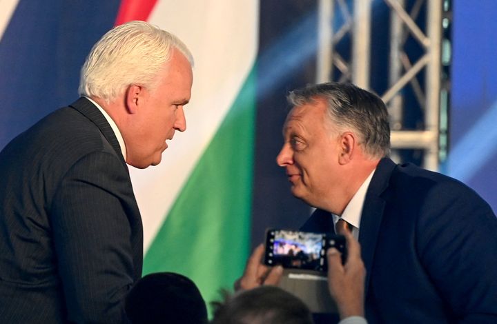 CPAC chair Matt Schlapp, left, huddles with extremist Hungarian Prime Minister Viktor Orbán during an extraordinary session of CPAC in Budapest, Hungary, on May 19.