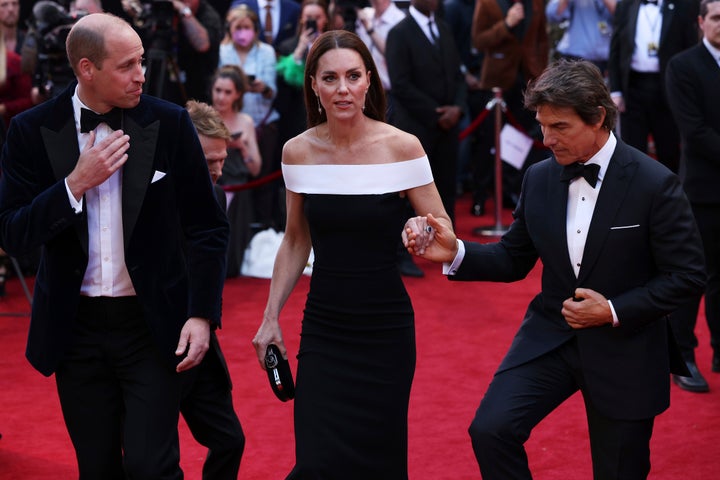 Prince William and Kate Middleton are accompanied by actor Tom Cruise, right, as they attend the "Top Gun Maverick" UK premiere in London.