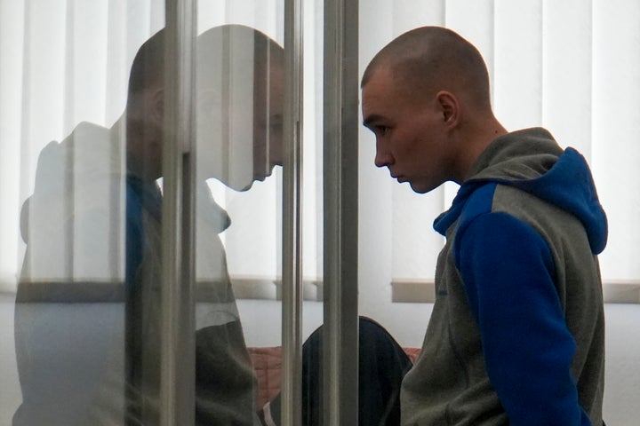 Russian Sgt. Vadim Shishimarin stands in court during a hearing in Kyiv, Ukraine, on May 19, 2022.