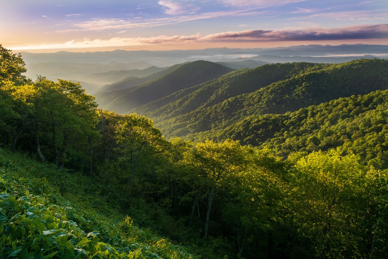 The sun rises over the Appalachian Mountains near Mt. Pisgah, about two hours west of Gaston County.