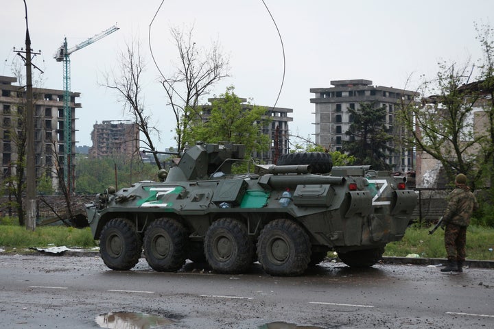 An APC of Donetsk People's Republic militia stands not far from Mariupol's besieged Azovstal steel plant, in Mariupol, in territory under the government of the Donetsk People's Republic, eastern Ukraine, on May 19, 2022.