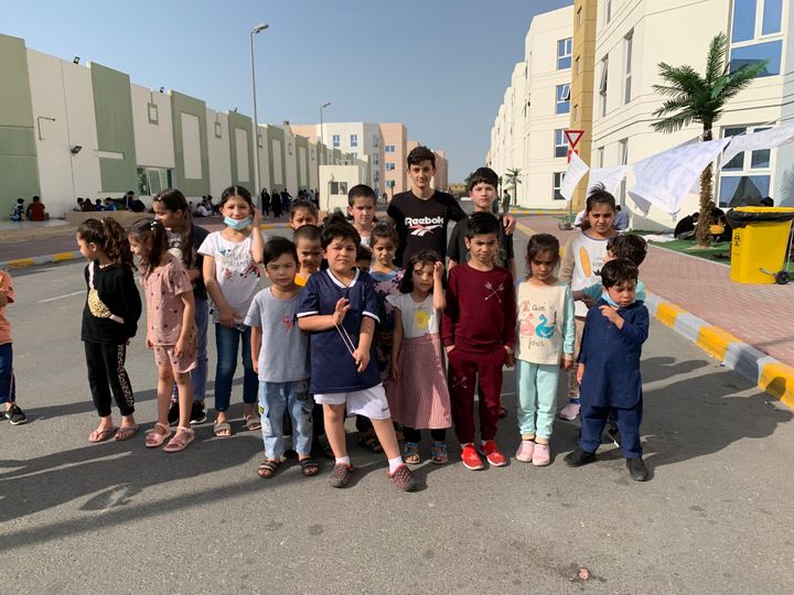 Afghans rallied in an Afghan refugee camp in Abu Dhabi, the capital of the United Arab Emirates, to protest the non-transfer to the United States on Sunday, Feb. 13.