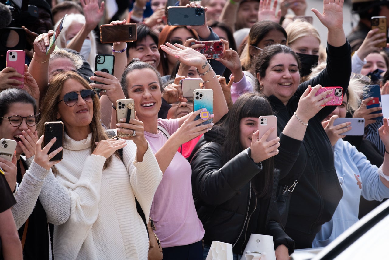 Fans cheered Johnny Depp and waved handcrafted signs at the entrance to the courthouse.