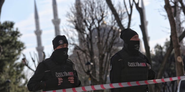 ISTANBUL, TURKEY - JANUARY 12: Turkish police secure the area after an explosion in the central Istanbul Sultanahmet district on January 12, 2016 in Istanbul, Turkey. At least 10 people have been killed and 15 wounded in a suicide bombing near tourists in the central Istanbul historic Sultanahmet district, which is home to world-famous monuments including the Blue Mosque and the Hagia Sophia. Turkish President Erdogan has stated that the suicide bomber was of Syrian origin. (Photo by Can Erok/G